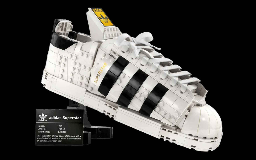 LEGO adidas orginals superstar shoe on a shoe stand with plaque 